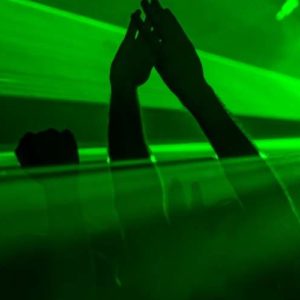 hands in the air at 1990 rave with lasers